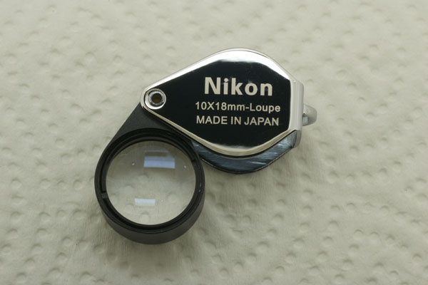 กล้องส่องพระ Nikon รุ่น FULL HD เลนย์แก้วขนาด10X 18mm. ส่องชัดใสสบายตา พกพาสะดวก มีให้เลือก2สี