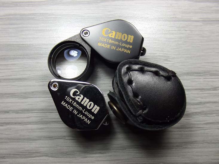 ราคาพิเศษกล้องส่องพระ CANON 10X18MMตัวเรือนเหล็กหลังFULL HD พร้อมซองหนังจัดส่งแบบEMS 