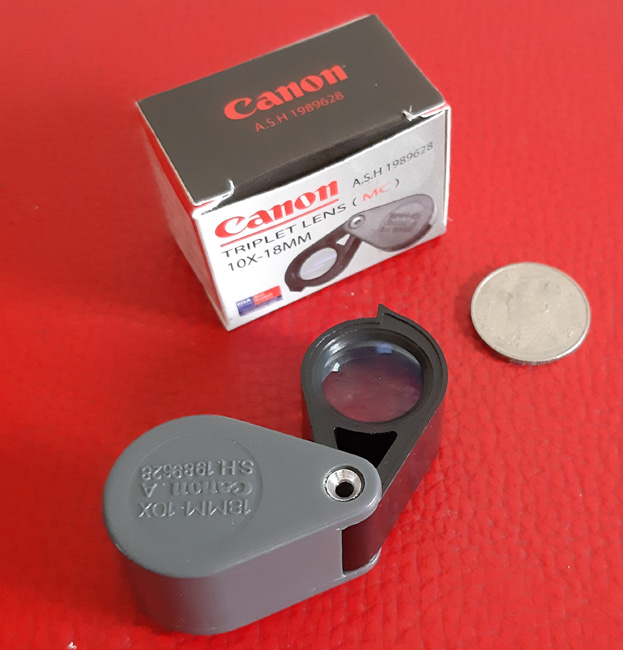 กล้องส่องพระ Canon A.S.H. 1989628 10X - 18 mm. ขนาดเลนส์ กว้าง 18 mm. - สีเทา-สีดำ