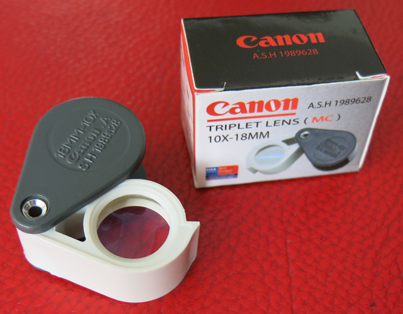 กล้องส่องพระ Canon A.S.H. 1989628 10X - 18 mm. ขนาดเลนส์ กว้าง 18 mm. - สีเทา-สีขาว