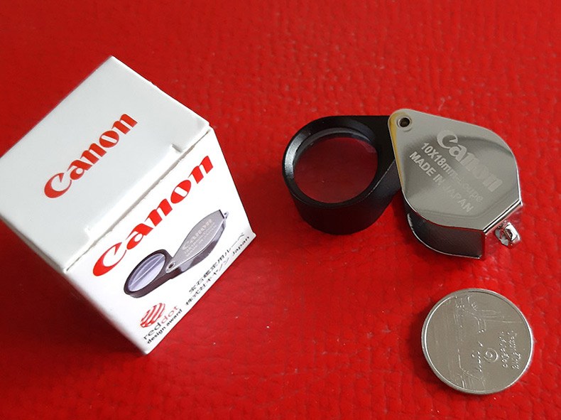 กล้องส่องพระ Canon 10X - 18 mm. Loupe ขนาดเลนส์ กว้าง 18 mm เนื้อเลนส์แก้วมัลติโค้ต -- บอดี้สีเงิน