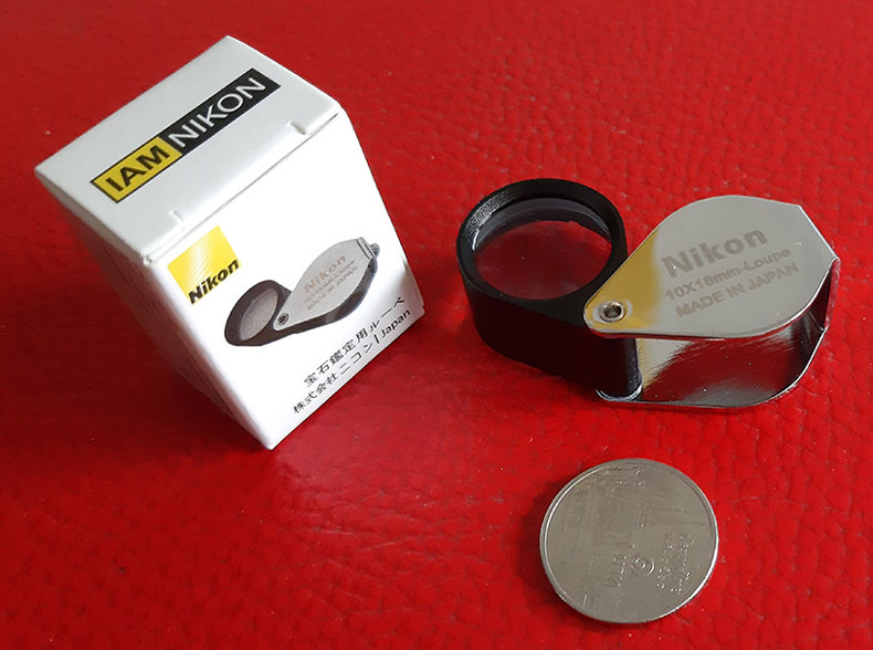 กล้องส่องพระ Nikon 10X - 18 mm. Loupe ขนาดเลนส์ กว้าง 18 mm เนื้อเลนส์แก้วมัลติโค้ต - บอดี้สีเงิน