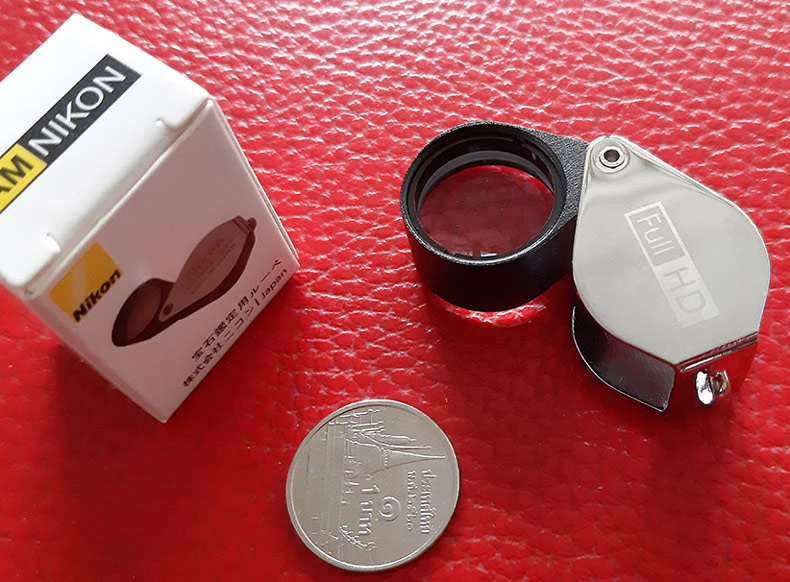 กล้องส่องพระ Nikon 10X - 18 mm. Loupe ขนาดเลนส์ กว้าง 18 mm เนื้อเลนส์แก้วมัลติโค้ต - บอดี้สีเงิน