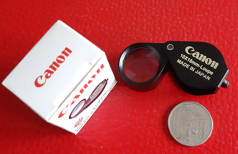 กล้องส่องพระ Canon 10X - 18 mm. Loupe ขนาดเลนส์ กว้าง 18 mm เนื้อเลนส์แก้วมัลติโค้ต - บอดี้สีดำ