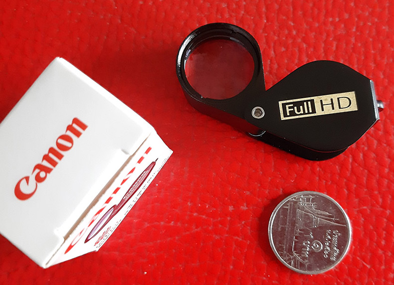 กล้องส่องพระ Canon 10X - 18 mm. Loupe ขนาดเลนส์ กว้าง 18 mm เนื้อเลนส์แก้วมัลติโค้ต - บอดี้สีดำ