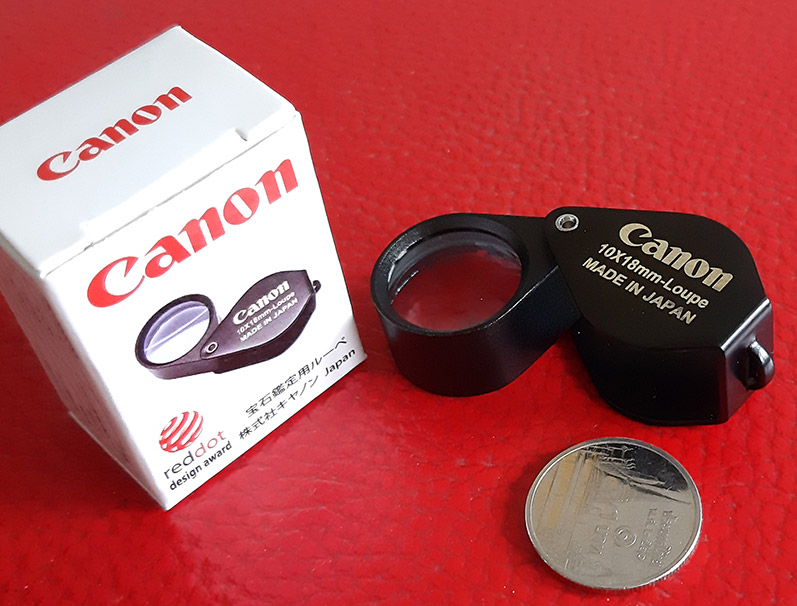 กล้องส่องพระ Canon 10X - 18 mm. Loupe ขนาดเลนส์ กว้าง 18 mm เนื้อเลนส์แก้วมัลติโค้ต - บอดี้สีดำ